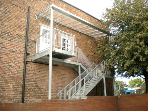 Fabricated External Staircase with Integral Glazed Canopy Unit