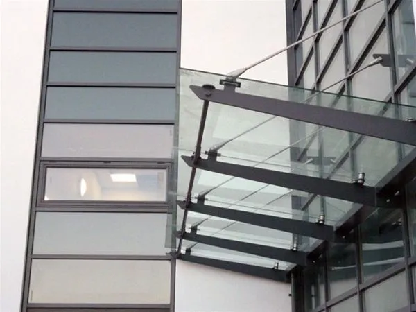 Suspended Glass Canopies both Radial and Straight to Office Development Project in Brighton