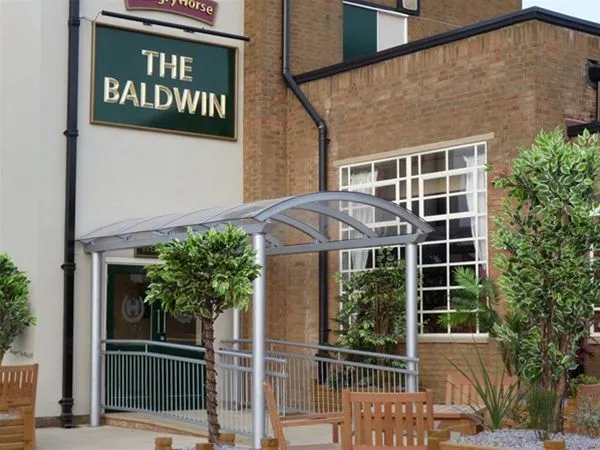 Supported Curved Polycarbonate Entrance Canopy Public House Birmingham